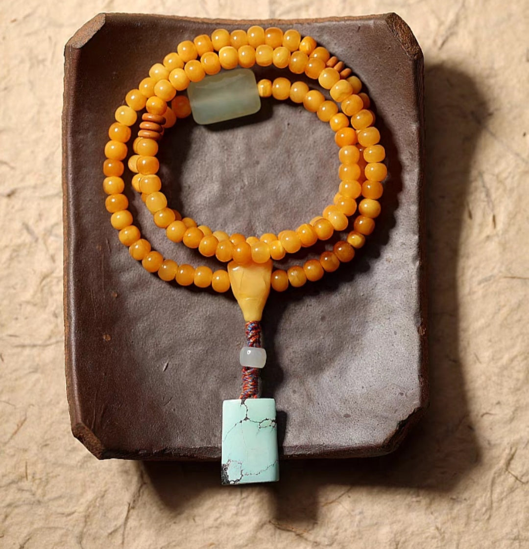 108 Mala Beads: Honey Amber Beads with Turquoise Pendant