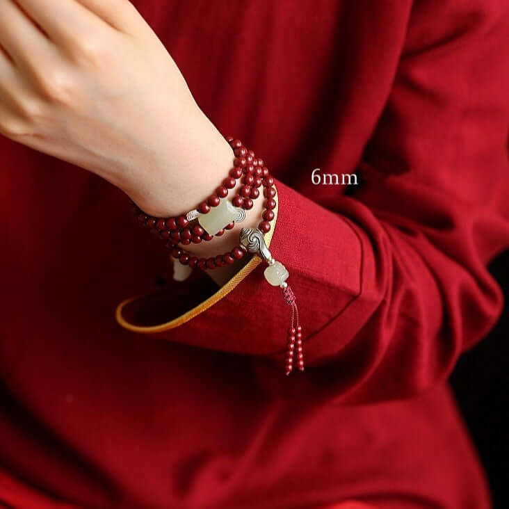 Wrist Wear Conch Shell Symbol- Natural Cinnabar 108 Mala Beads