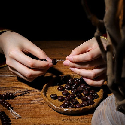 A Piece of Tibet: Handcrafted Palm Seed Mala