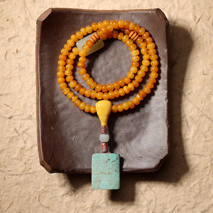 108 Mala Beads: Honey Amber Beads with Turquoise Pendant