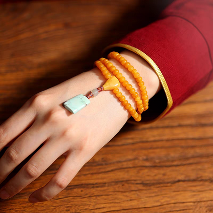 108 Mala Beads: Honey Amber Beads with Turquoise Pendant